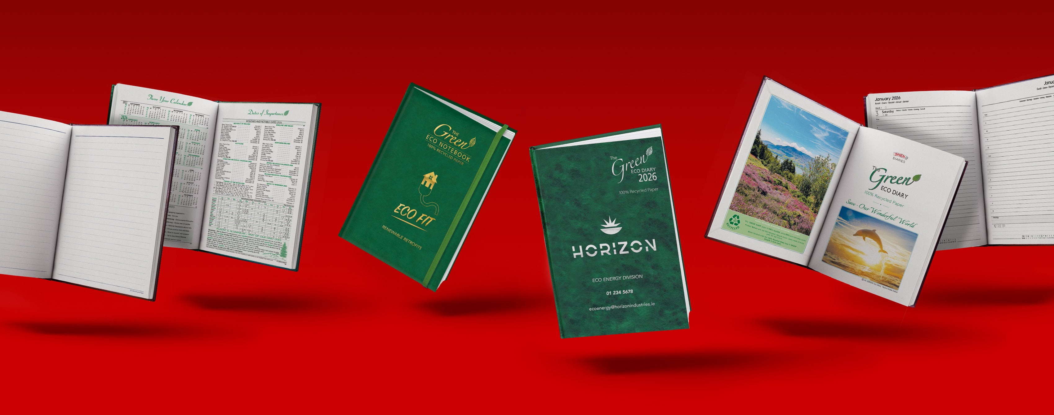 Collection of green eco diaries & notebooks on a red background